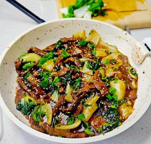 a-delicious-plate-of-beef-and-bok-choy-stir-fry-topped-with-sesame-seeds